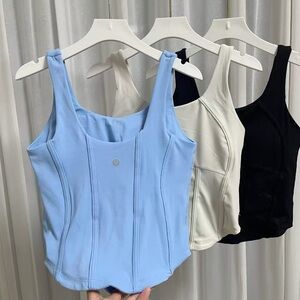Lululemon Athletica Blue, White, and Black Tank Tops